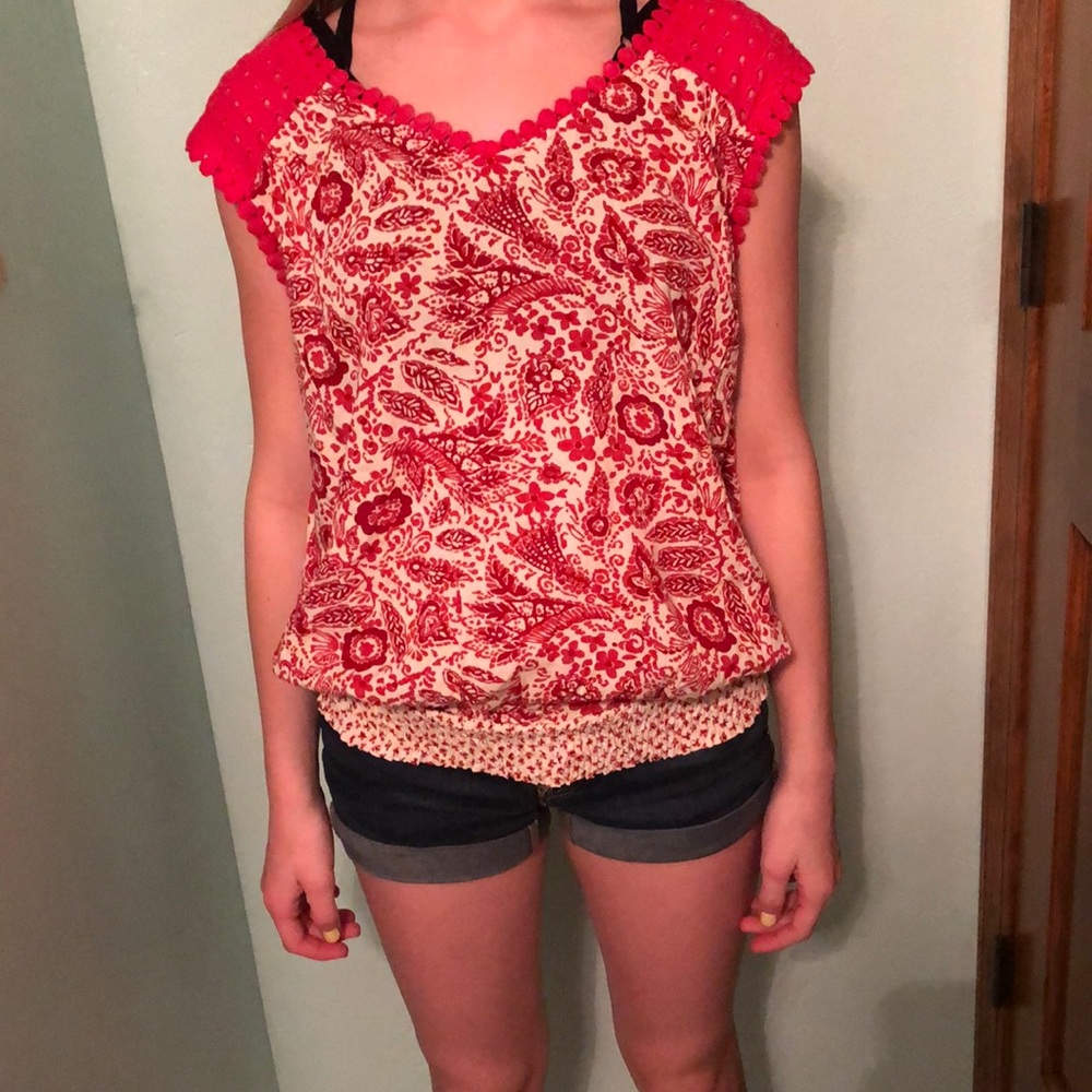 Red flowered blouse with elastic hem